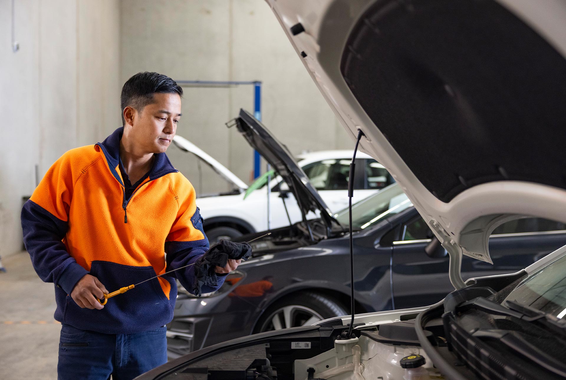 An inspector inspecting a car